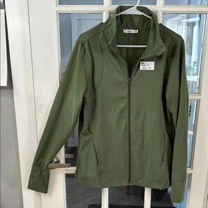 Q2.    Ricki’s Women's Utility Jacket in Olive